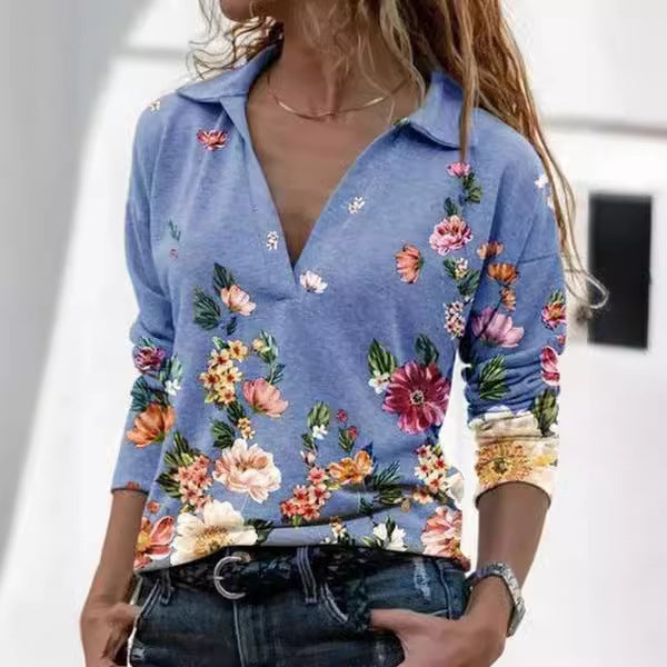 Damebluse med blomsterdesign og polo-krave Stilla
