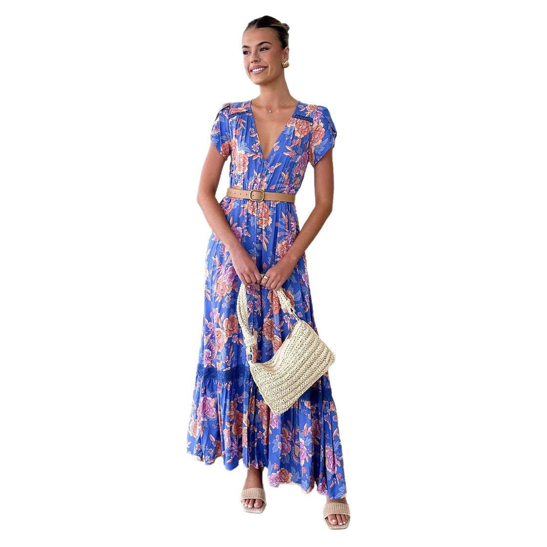 Dame maxi kjole med elegant V-udskæring og feminine flæse detaljer