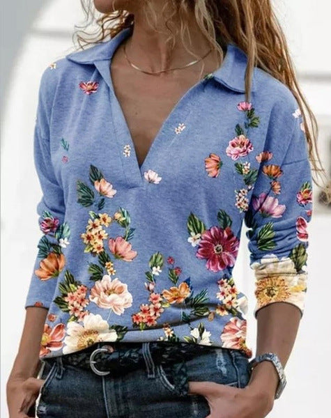 Damebluse med blomsterdesign og polo-krave Stilla