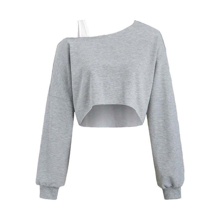 Kvinders cropped sweatshirt med asymmetrisk design og voluminøse ærmer Stilla