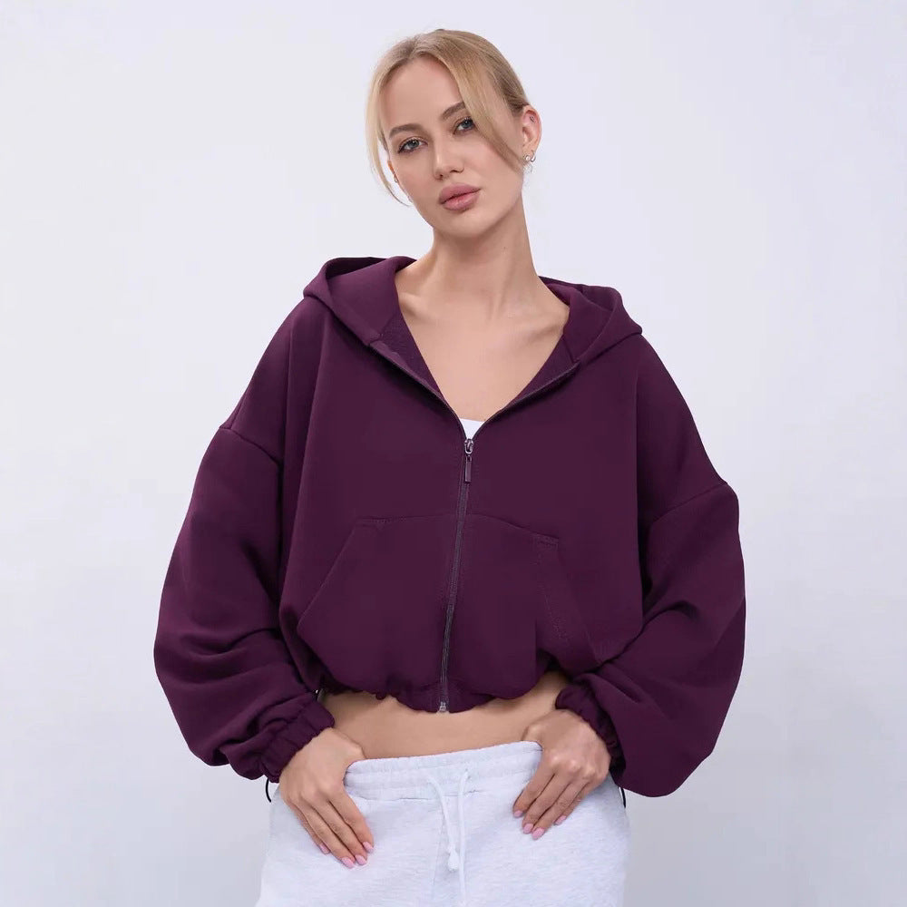 Dame cropped hoodie jakke med voluminøse ærmer og praktiske lommer Skovae