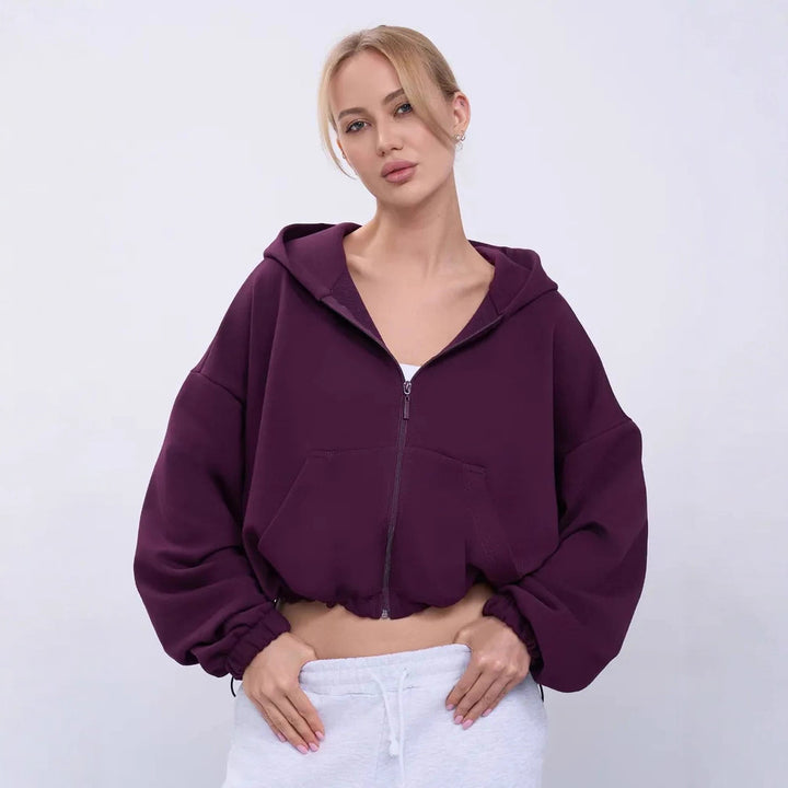 Dame cropped hoodie jakke med voluminøse ærmer og praktiske lommer Skovae