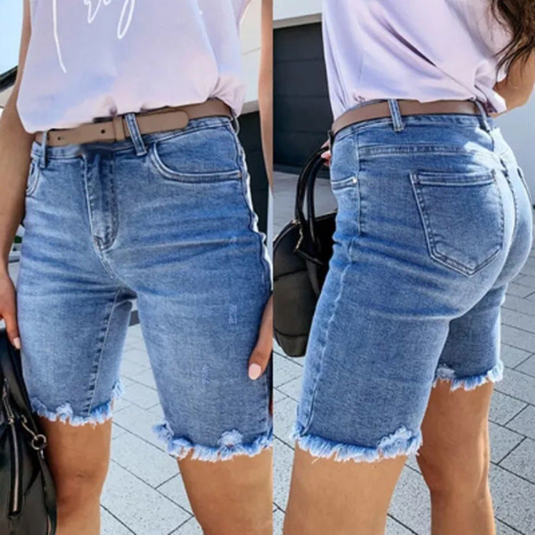 Dame jeans-shorts i moderne relaxed-fit stil med frynsekant Stilla
