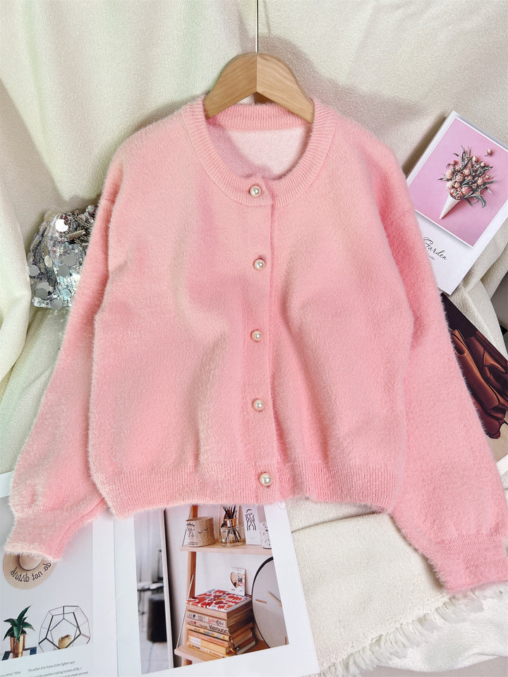 Kvindernes hyggelige cardigan med perlebesatte knapper og moderne snit Stilla