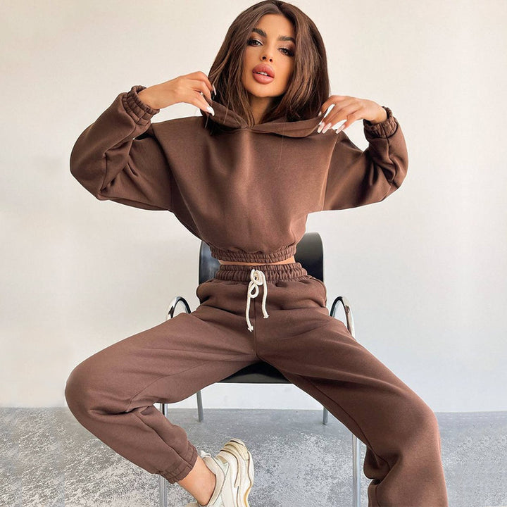 Kvinders sporty cropped sweat sæt med elastisk talje og praktiske lommer
