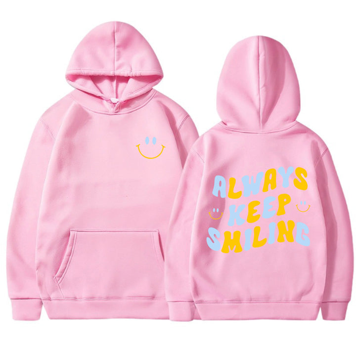 Dame hoodie med munter skrift og praktiske kangaroo lommer Skovae