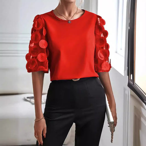 Dame moderigtig bluse med transparente puffærmer og runde applikationer Stilla