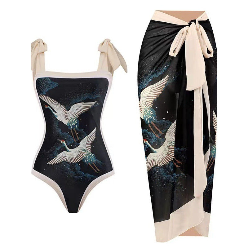 Dame Én-delt Badedragt med stilfuld Wrap Skirt og moderigtigt mønster Skovae