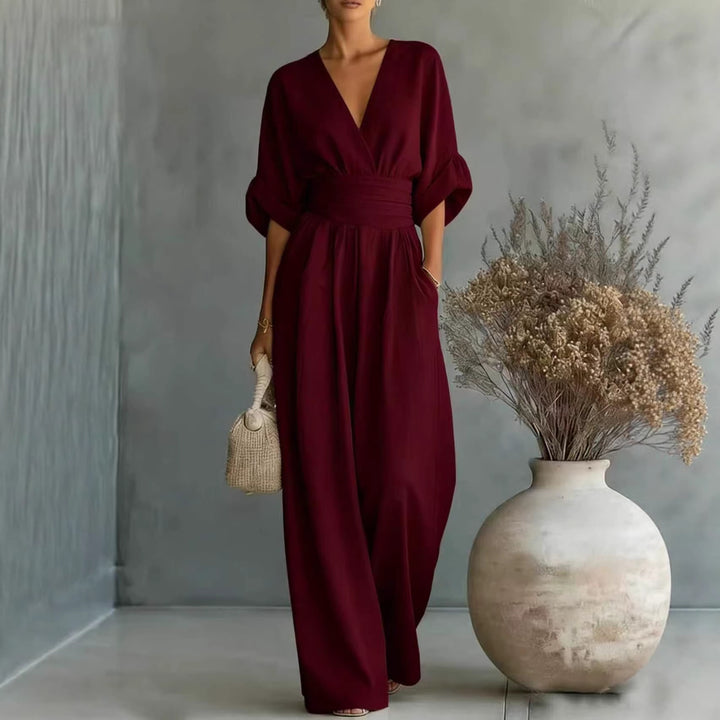 Dame jumpsuit med elegant V-udskæring og bredt ben Skovae