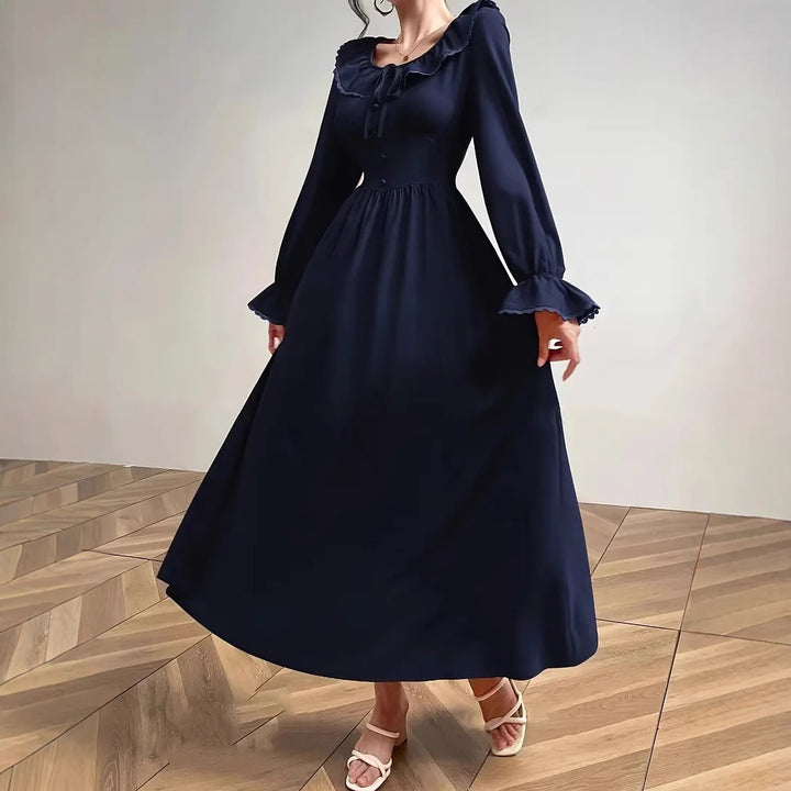 Dame Maxikjole med elegante flæsedetaljer og lange ærmer Stilla
