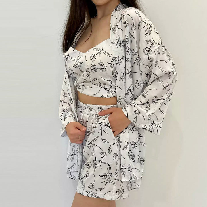 Dame pyjamasæt med detaljeret blomsterdesign og luftig pasform Stilla