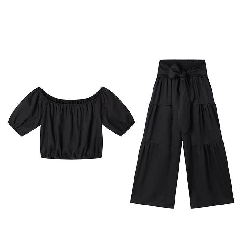Dame stilfuld off-shoulder crop top og bred bukser sæt Stilla