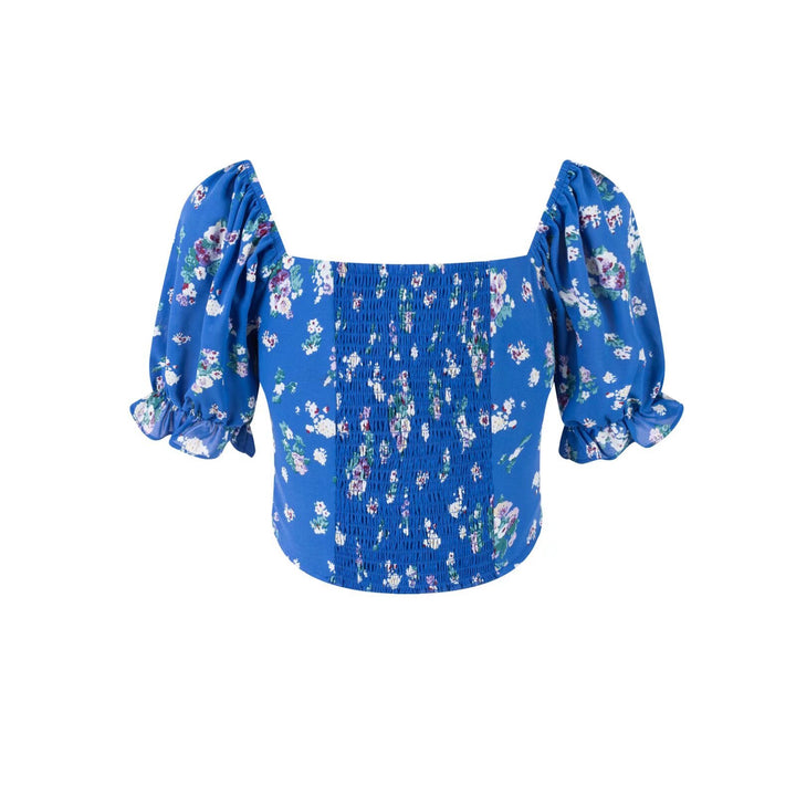 Damebluse med elastiske pufærmer og floralt design Stilla