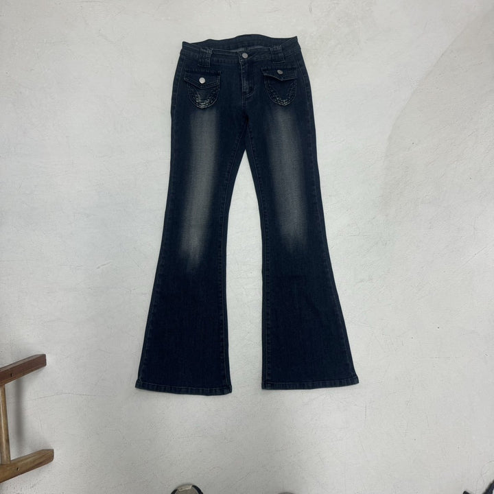 Dame Flared Jeans i klassisk snit med dekorative lommer Skovae
