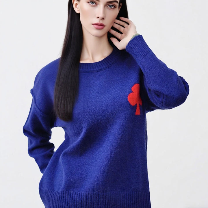 Dame mønsteret kort sweater lavet af blødt strikmateriale med det ikoniske Stilla-logo