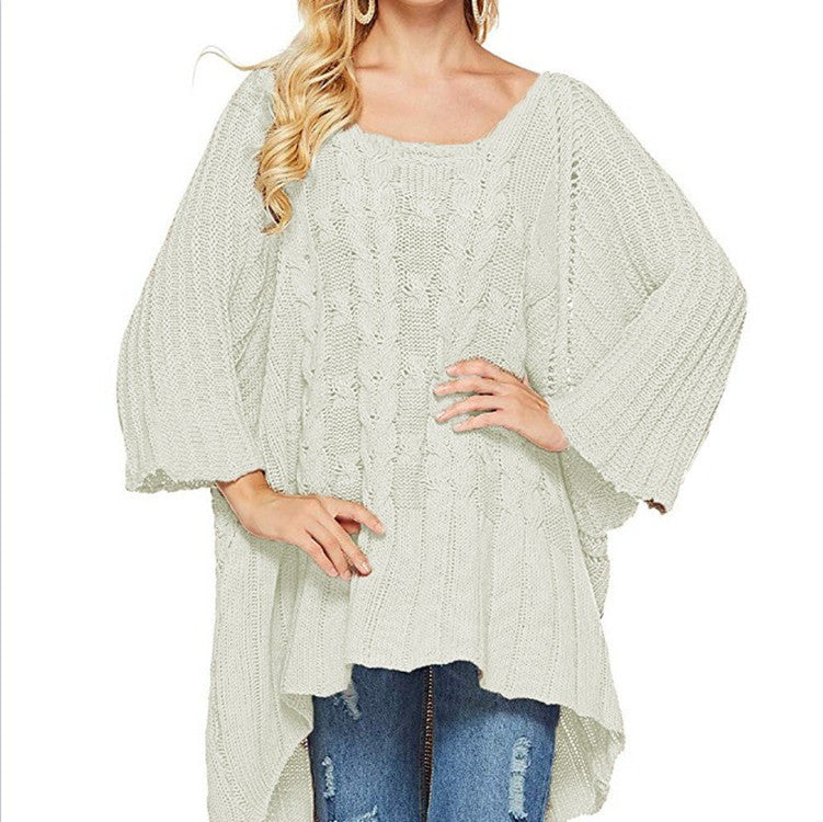 Women's chunky knit poncho with trendy cable pattern and wide sleeves Stilla