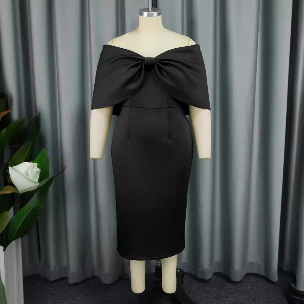 Damer Elegant Midi-kjole med overdimensioneret sløjfe-detalje Skovae