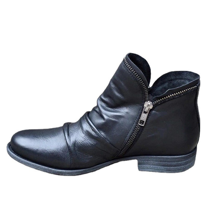 Dame Ankelstøvler med moderne slip-on design og praktiske lynlåse Stilla