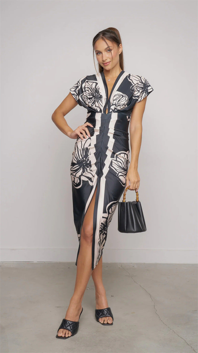 Dame Midi-kjole med blomstret design og elegant split Stilla