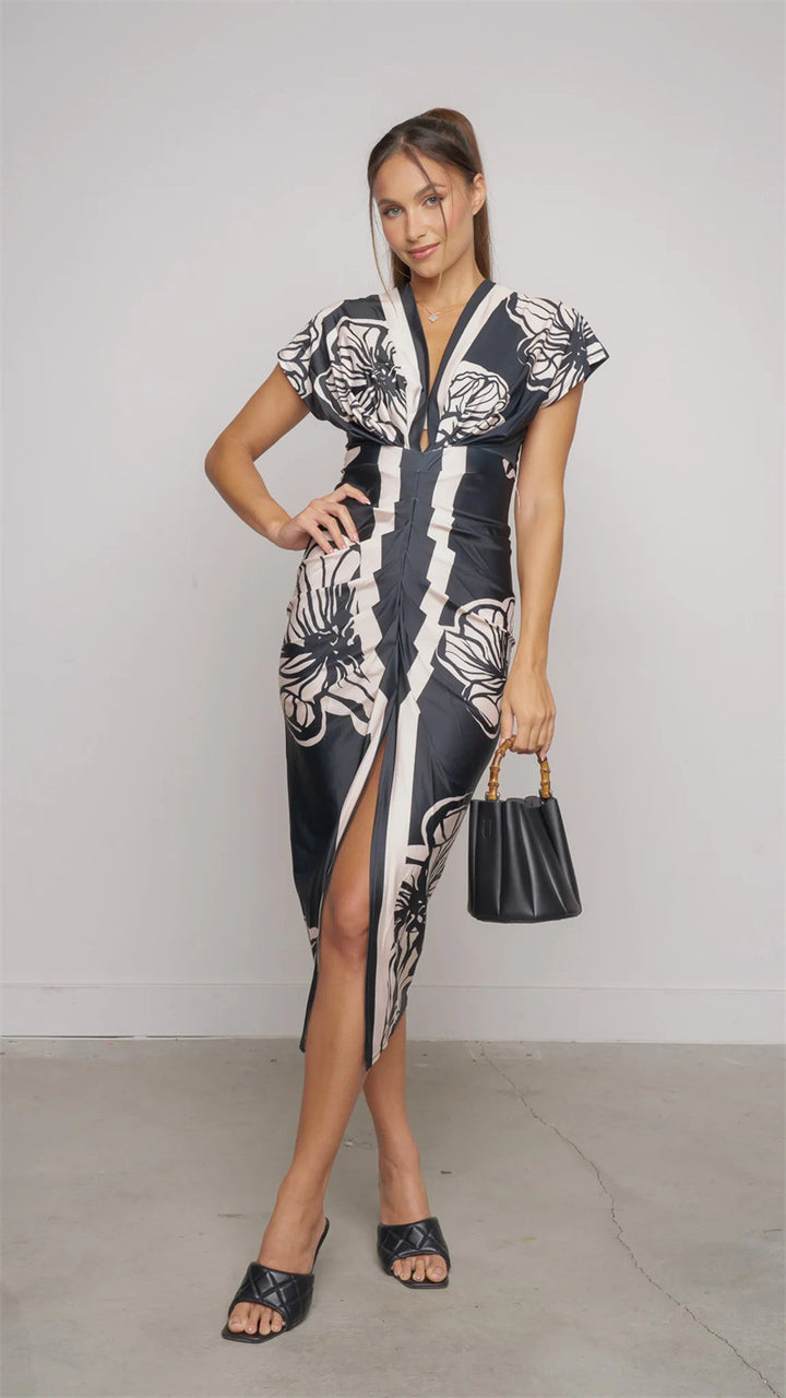 Dame Midi-kjole med blomstret design og elegant split Stilla