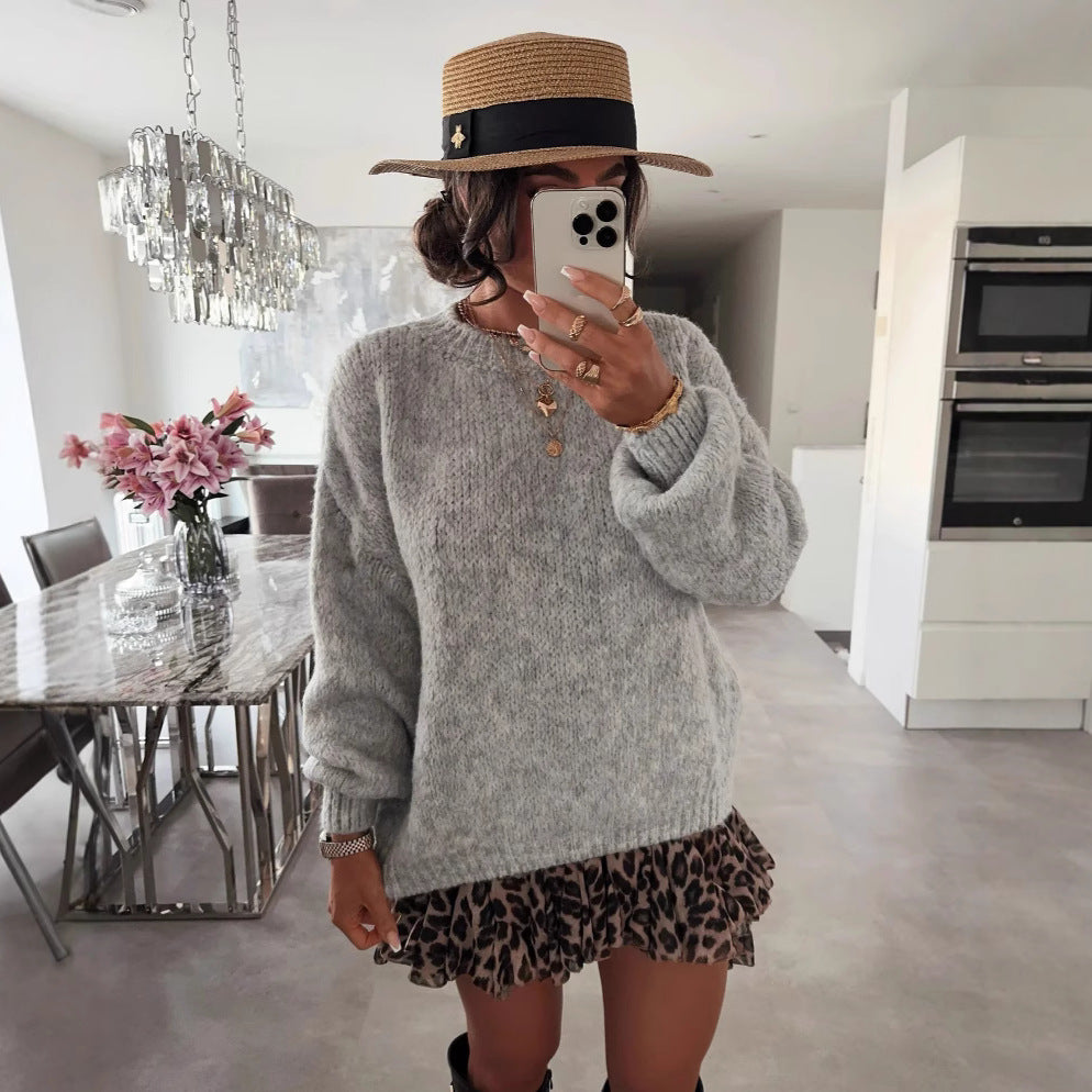Kvinders oversized strikket sweater med voluminøse ærmer og moderne design Stilla