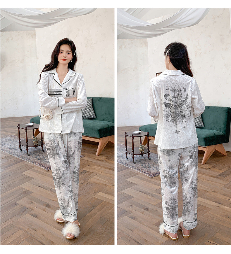 Dame luksus natwear sæt med blomstermønster og elegant design Stilla