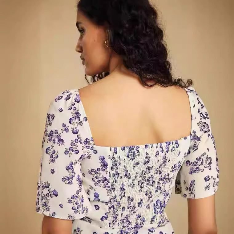 Dame bomuldsbluse med blomstermotiv og romantiske flæse detaljer Stilla