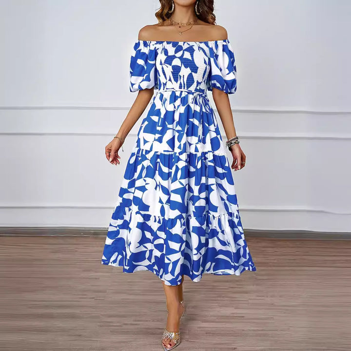 Dame maxikjole i afslappet off-shoulder design med voluminøse ærmer og blomsterprint Stilla