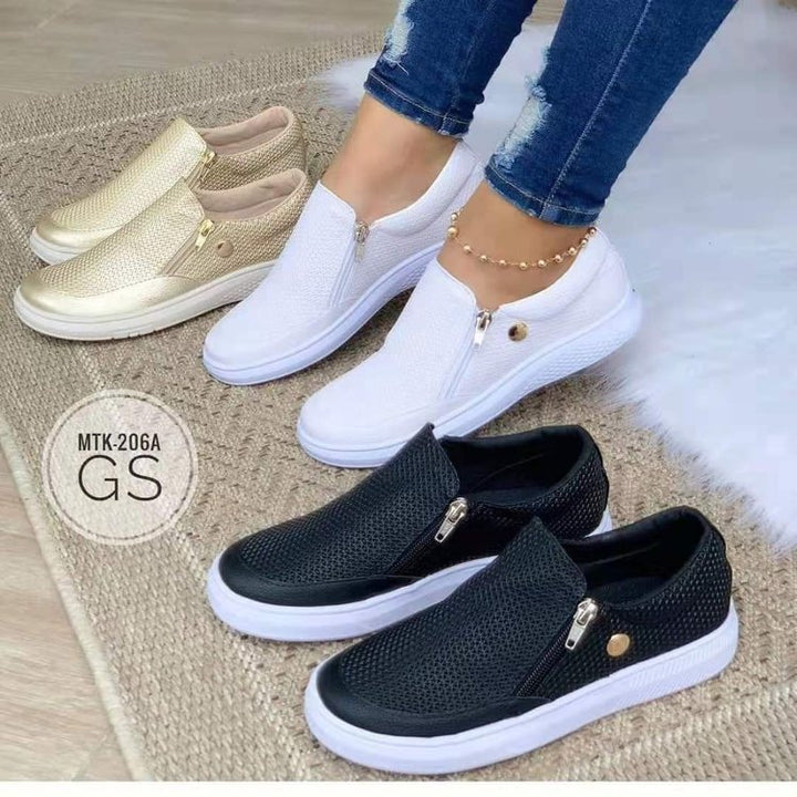 Dame Slip-On Sneakers med fashionable lynlåsdesign og åndbart overflade Stilla