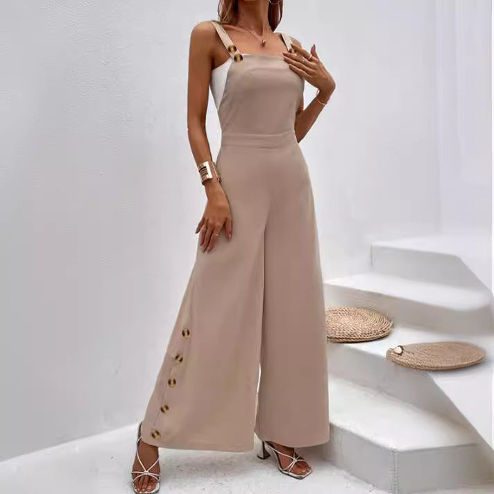 Dame jumpsuit i elegant snit med dekorative knapdetaljer Stilla