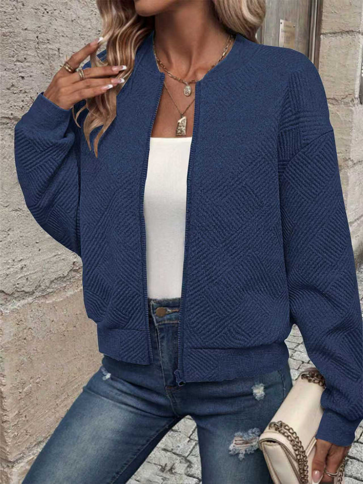 Dame moderigtig sweatjakke med tekstureret design og lynlås Stilla