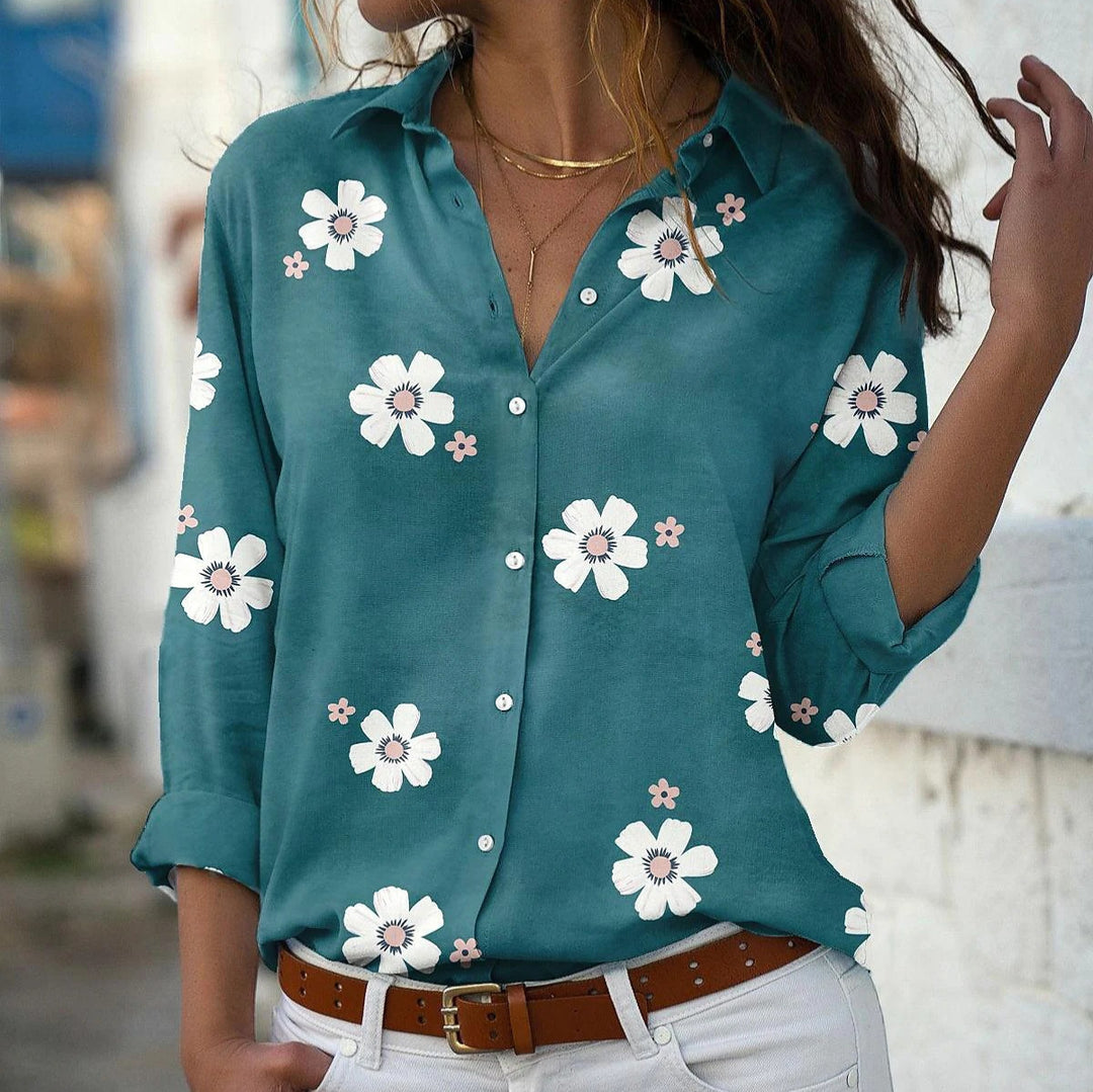 Damebluse med blomsterdesign og elegant krave Stilla