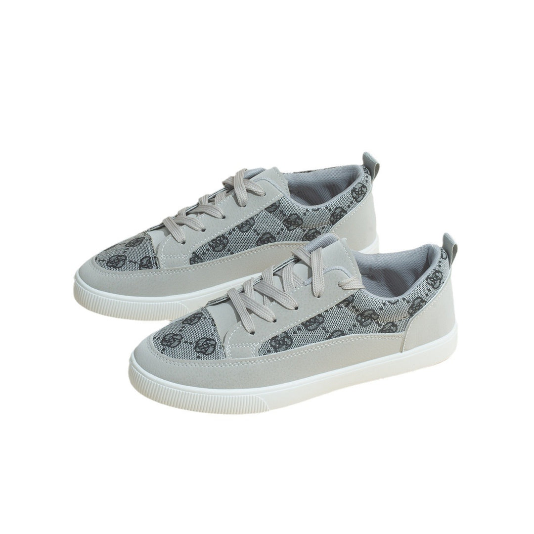 Dame sneakers med stilfuldt monogram-design og komfortabel sål Stilla