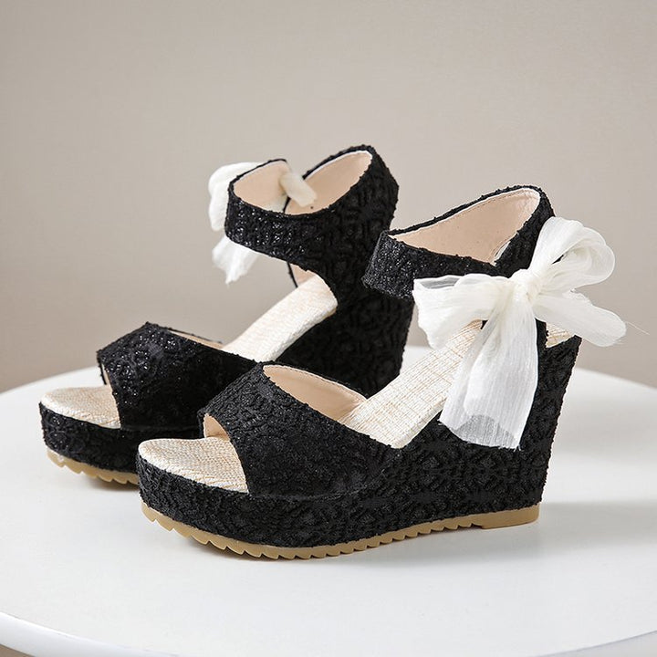 Dame nan romantisk kilehælsandalette med spidse detaljer og organza-sløjfe Skovae