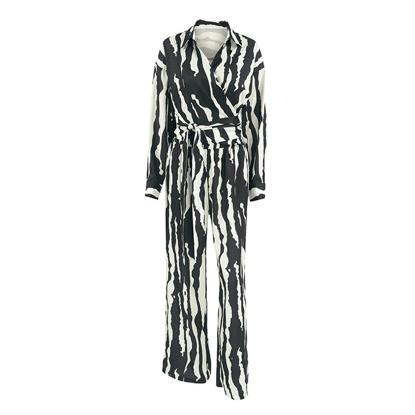 Dame elegant jumpsuit med asymmetrisk krave og sidelænbånd Stilla