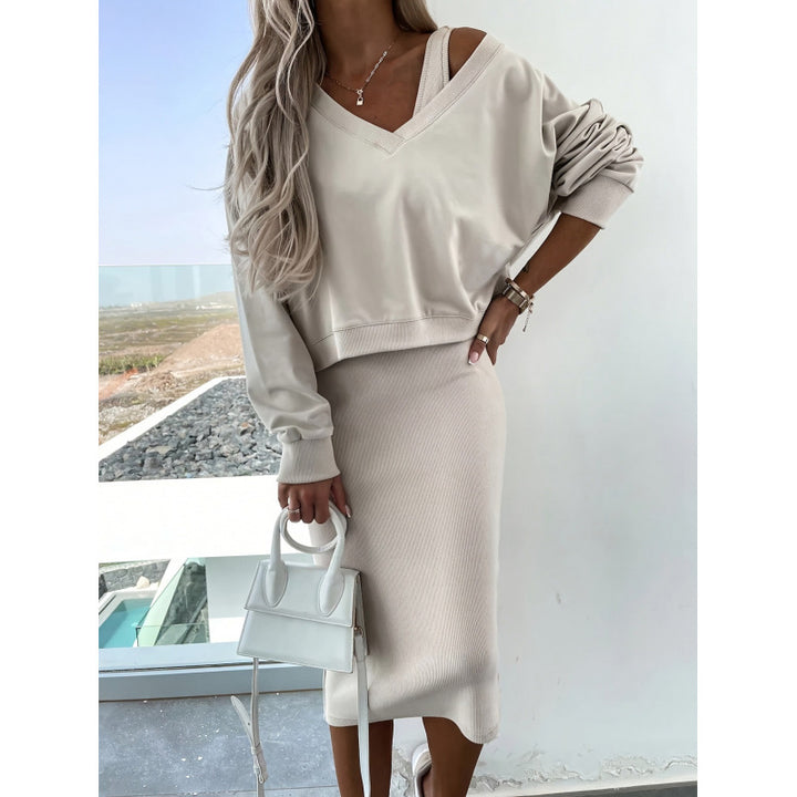 Dame kortærmet jumpsuit med flæse detaljer og bindebælte Skovae
