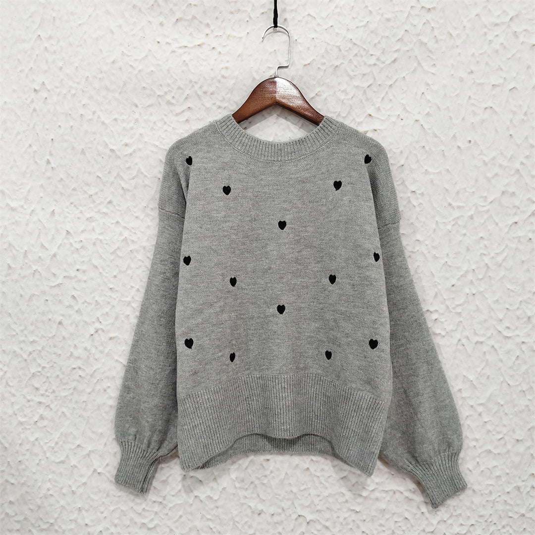 Kvinders sweater med legesyg hjerte mønster og afslappet pasform Stilla