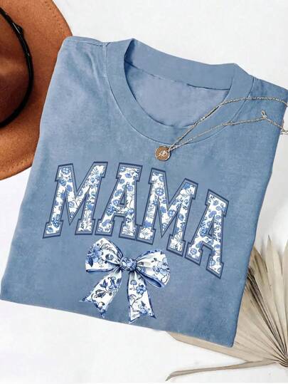 Dame T-shirt med blomster motiv og legende sløjfe dekoration Stilla