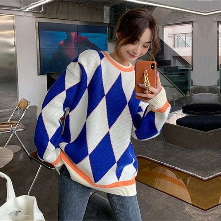 Kvinder's oversized strikket sweater med geometrisk mønster og farve kontraster Stilla