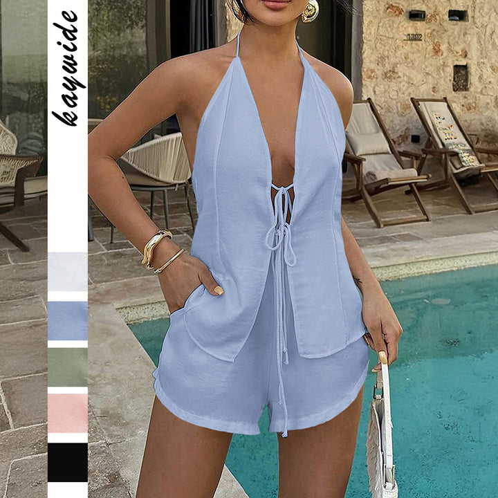 Dame kort sommer jumpsuit med ærmeløs design og bindebånd Stilla