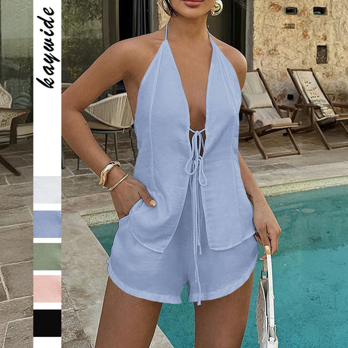 Dame kort sommer jumpsuit med ærmeløs design og bindebånd Stilla