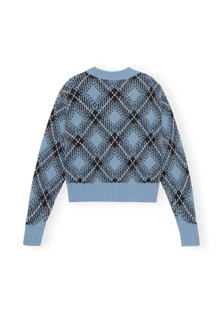 Dame sweater med stilfuldt ternet mønster og afslappet snit Stilla