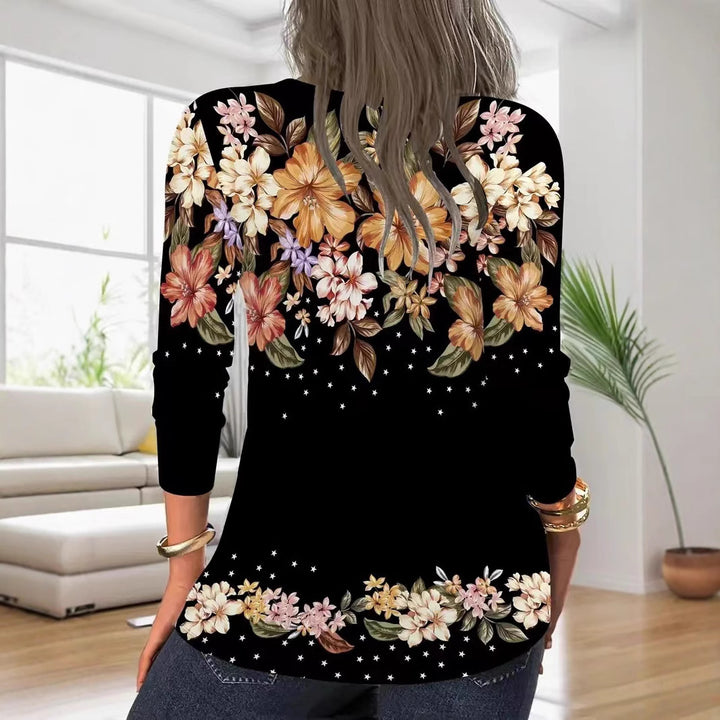 Damebluse med blomsterprint og lynlås Stilla