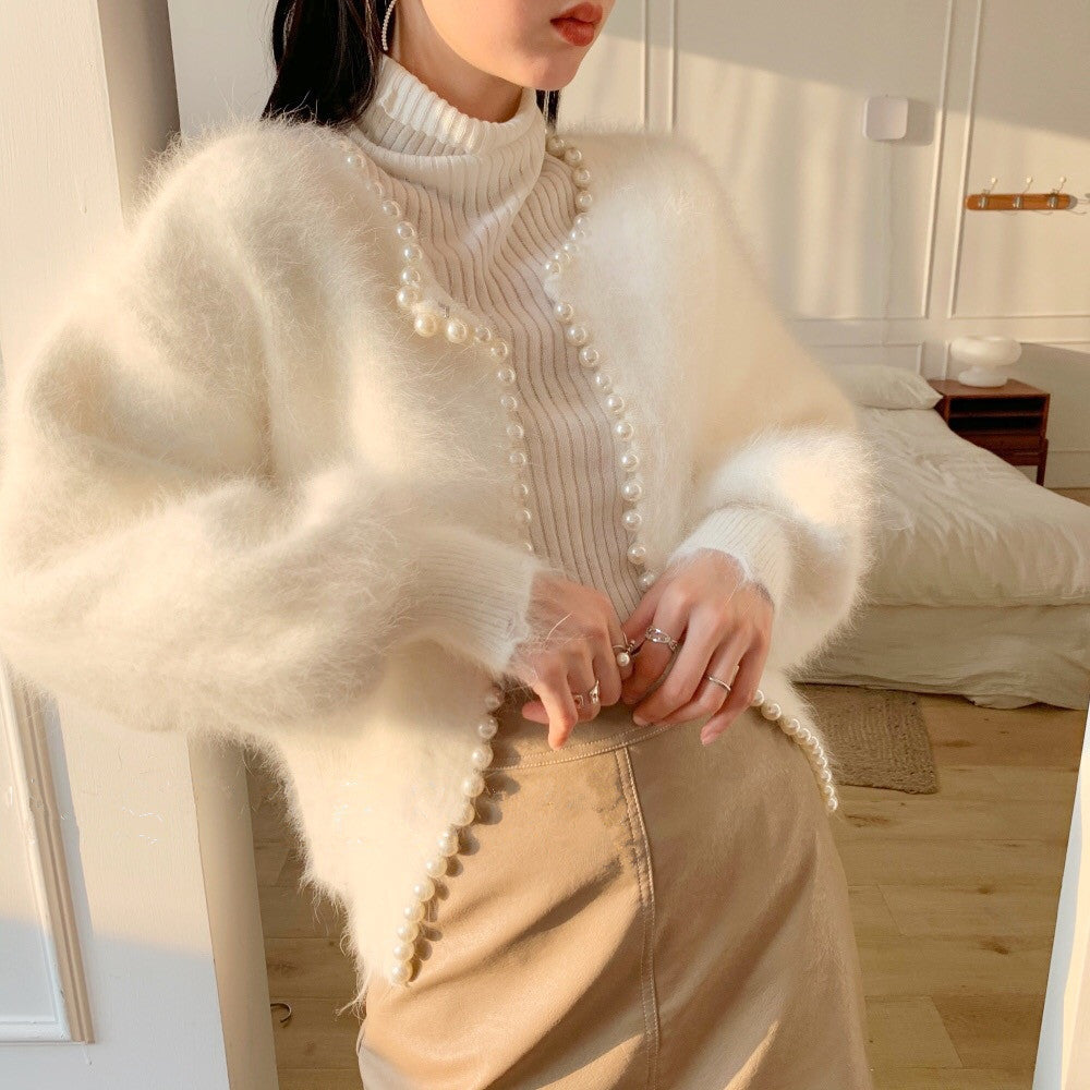 Kvinders fluffy cardigan med perlekant og trendy snit Stilla