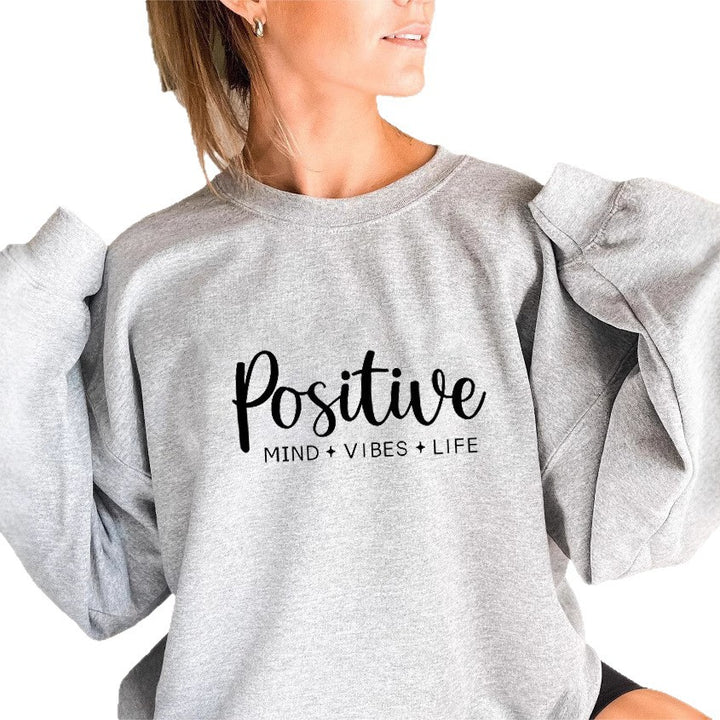 Kvinders sweatshirt med voluminøse ærmer og inspirerende print Stilla