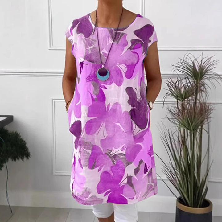 Dame nan let tunika-midi kjole lavet af linnedmix med akvarelblomsterprint og sidelommer Skovae