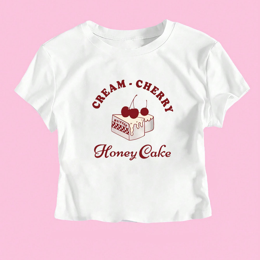 Dame Crop-T-Shirt med kreativ dessertmotiv og moderne snit Skovae