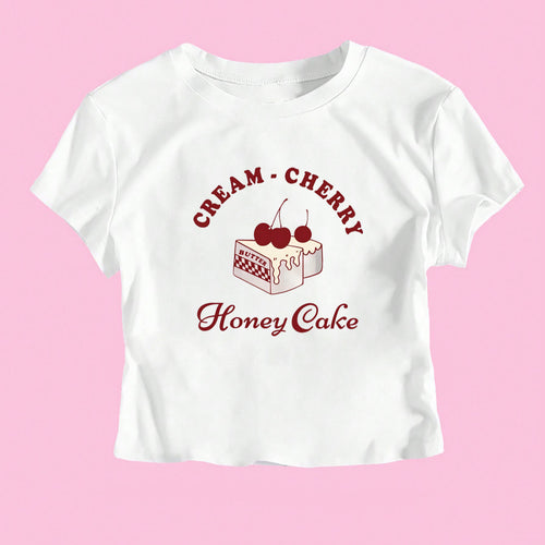 Dame Crop-T-Shirt med kreativ dessertmotiv og moderne snit Skovae