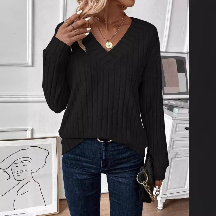 Dame V-hals strikbluse med lodret ribstruktur Stilla