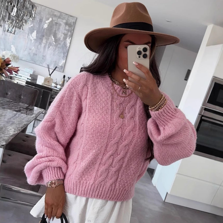 Kvinders chunky strik sweater med voluminøse ærmer og kabelmønster Stilla